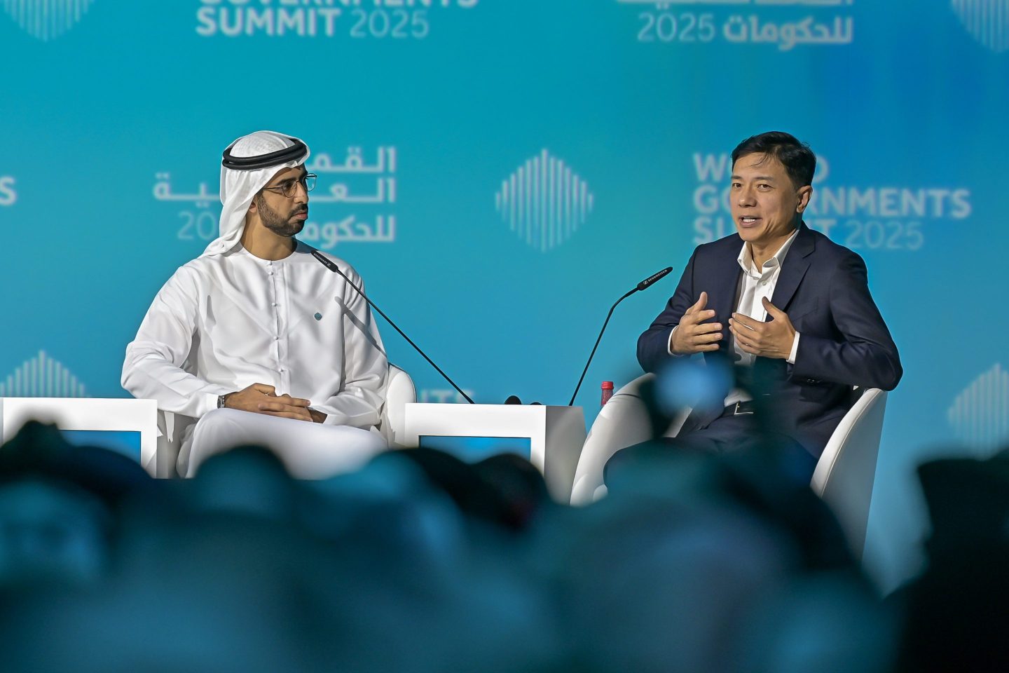 Robin Li (right), Baidu’s CEO, speaking with Omar Sultan Al Olama, UAE Minister of State for AI, Digital Economy, and Remote Work Applications, at the World Governments Summit on Feb. 11, 2025, in Dubai.