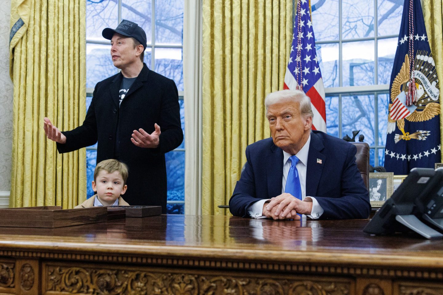 Elon Musk, chief executive officer of Tesla Inc., left, and US President Donald Trump in the Oval Office of the White House in Washington, DC