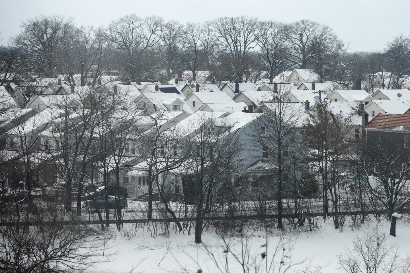 View of houses covered in snow