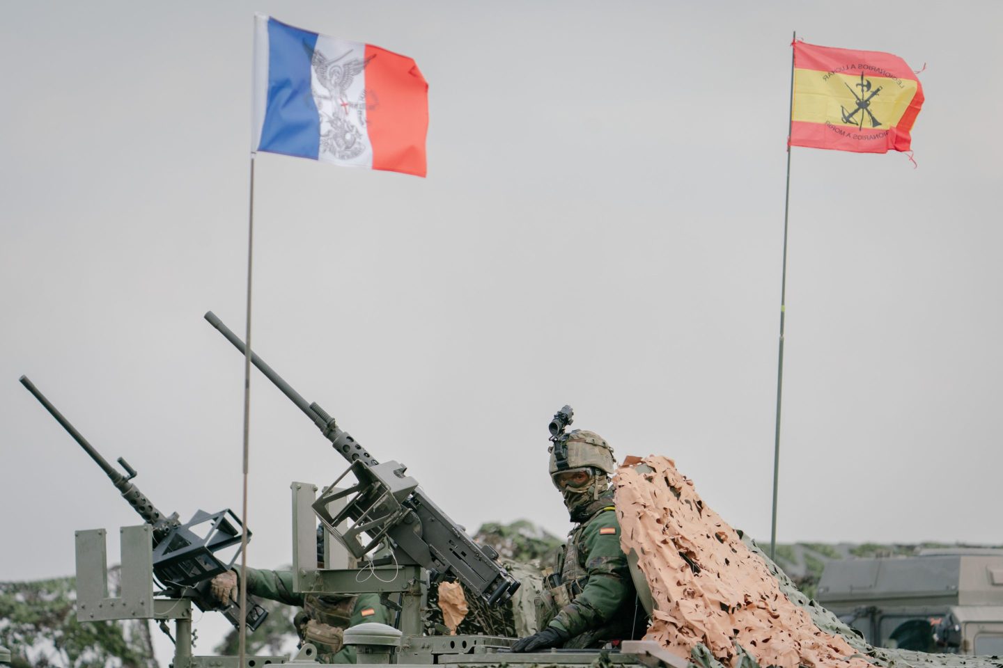 French and Spanish regimental flags at NATO’s Steadfast Dart 25 exercise in Smardan, Romania, on Feb. 19.