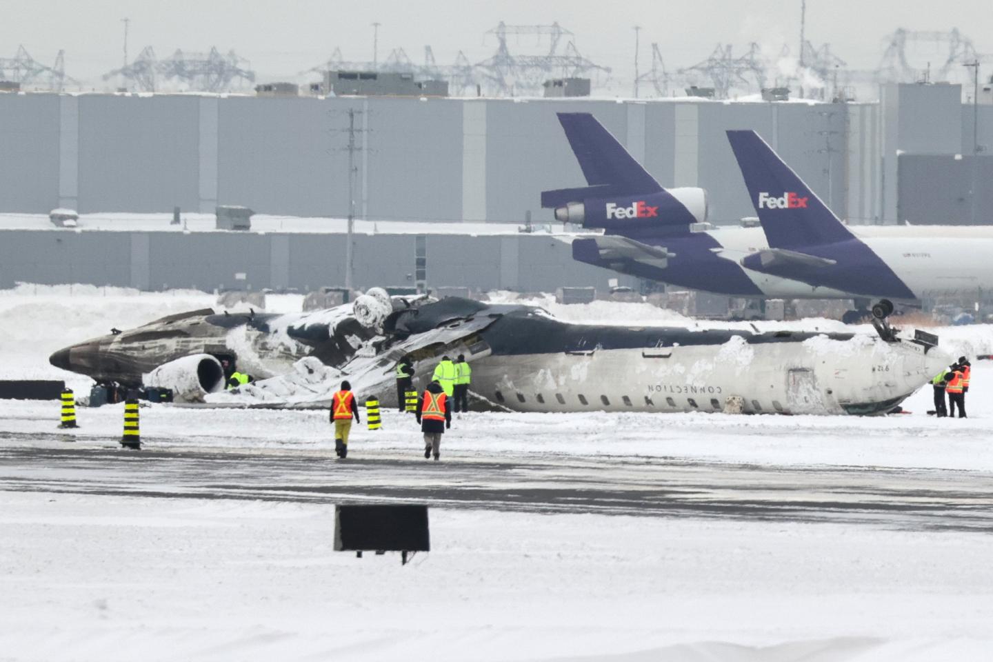 Wreckage of Delta Airlines plane that crashed upon landing at Toronto Pearson Airport