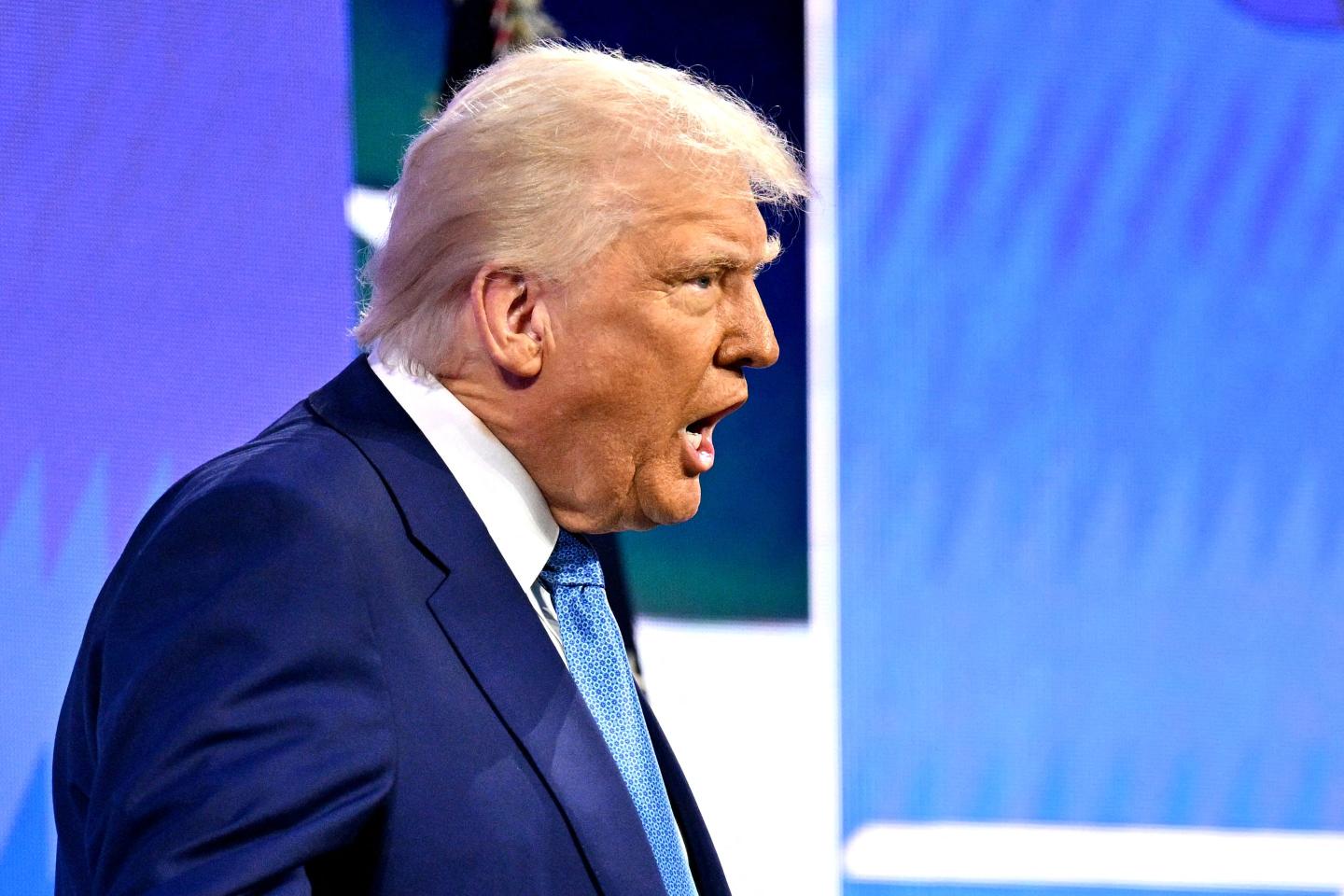 US President Donald Trump walks on stage to speak at FII PRIORITY Miami 2025 Summit (Future Investment Initiative) at the Faena Hotel & Forum in Miami Beach, Florida, February 19, 2025.