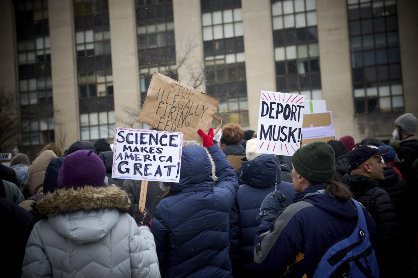 Former federal workers protest against the Department of Government Efficiency helmed by Elon Musk.
