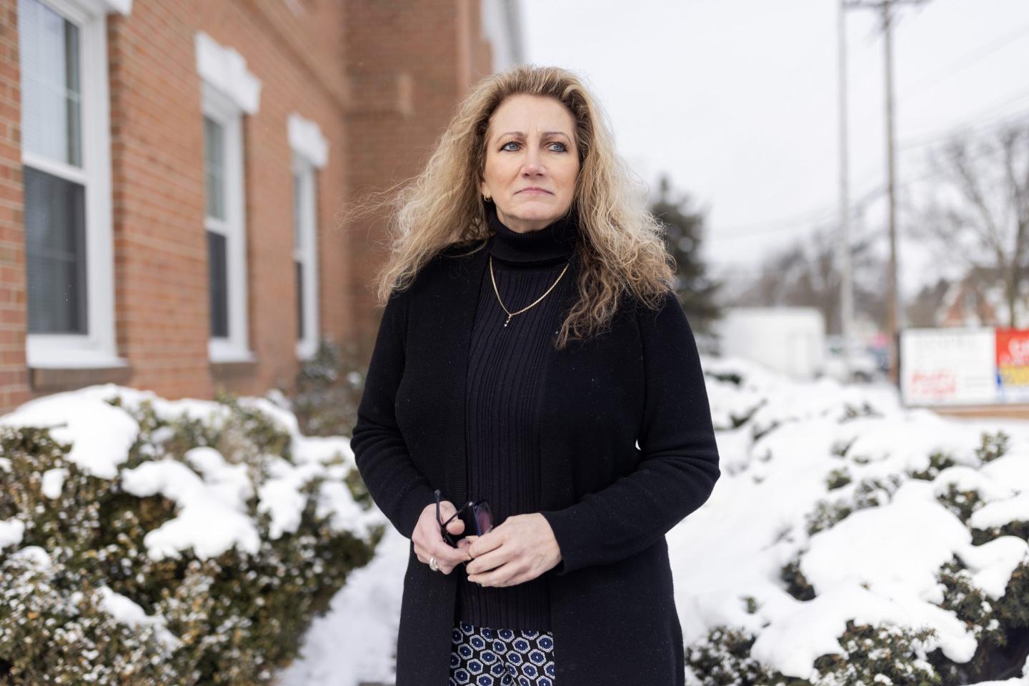 Marlean Ames outside of her lawyers office in Akron, OH.