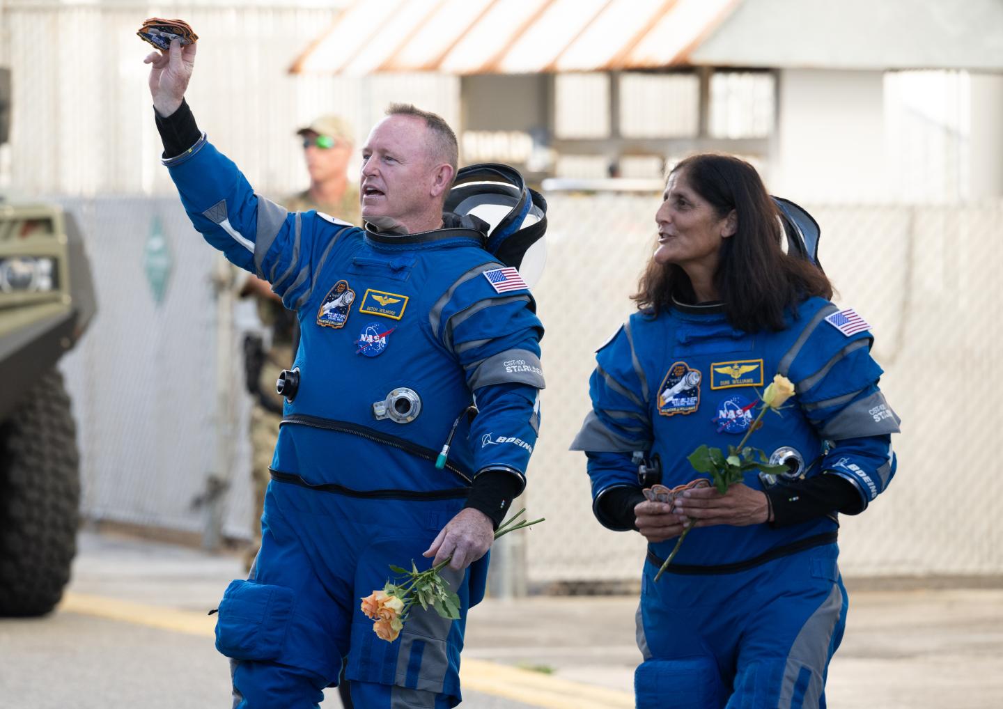 NASA astronauts Butch Wilmore, left, and Suni Williams, wearing Boeing spacesuits