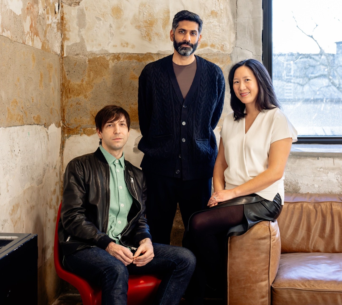 Zack Lipton, Shiv Rao, and Julia Chou wearing casual clothes and posing for a photo portrait