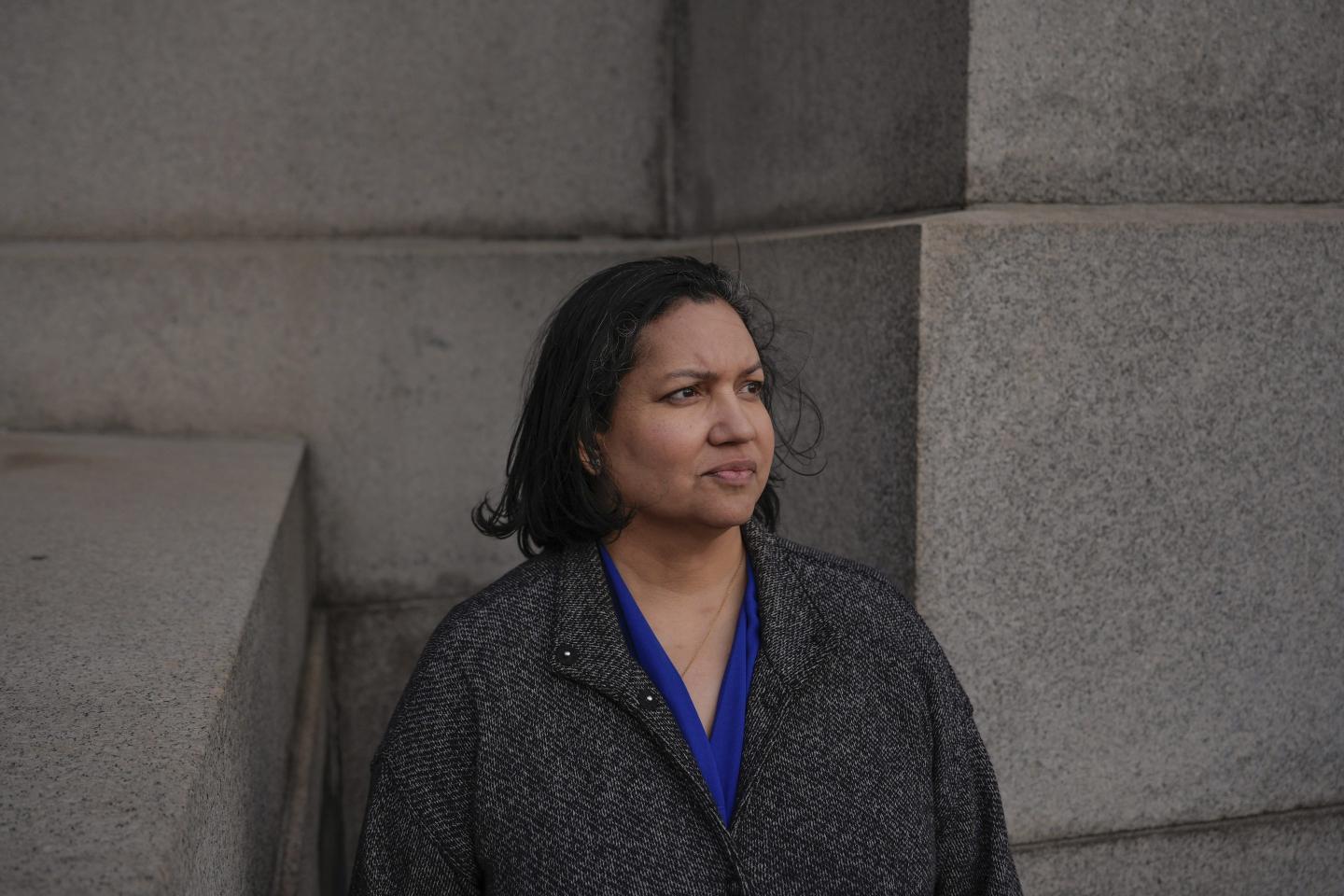 EEOC administrative judge Karen Ortiz poses for a picture