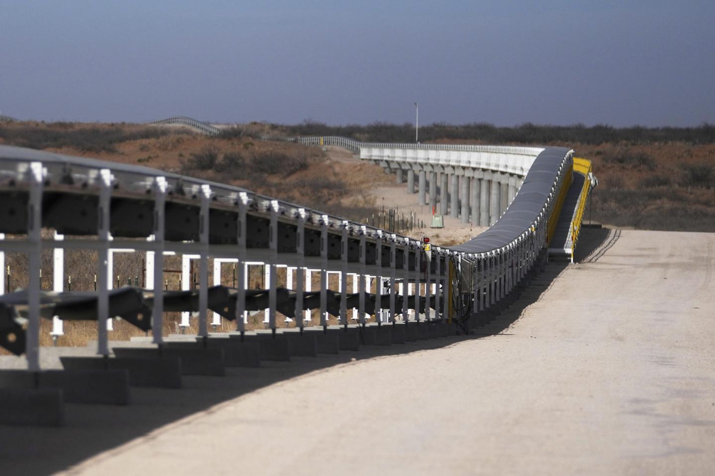 A 42-mile conveyor belt by Atlas Energy carries sand  needed for hydraulic fracturing on Feb. 26, 2025, in Kermit, Texas. 
