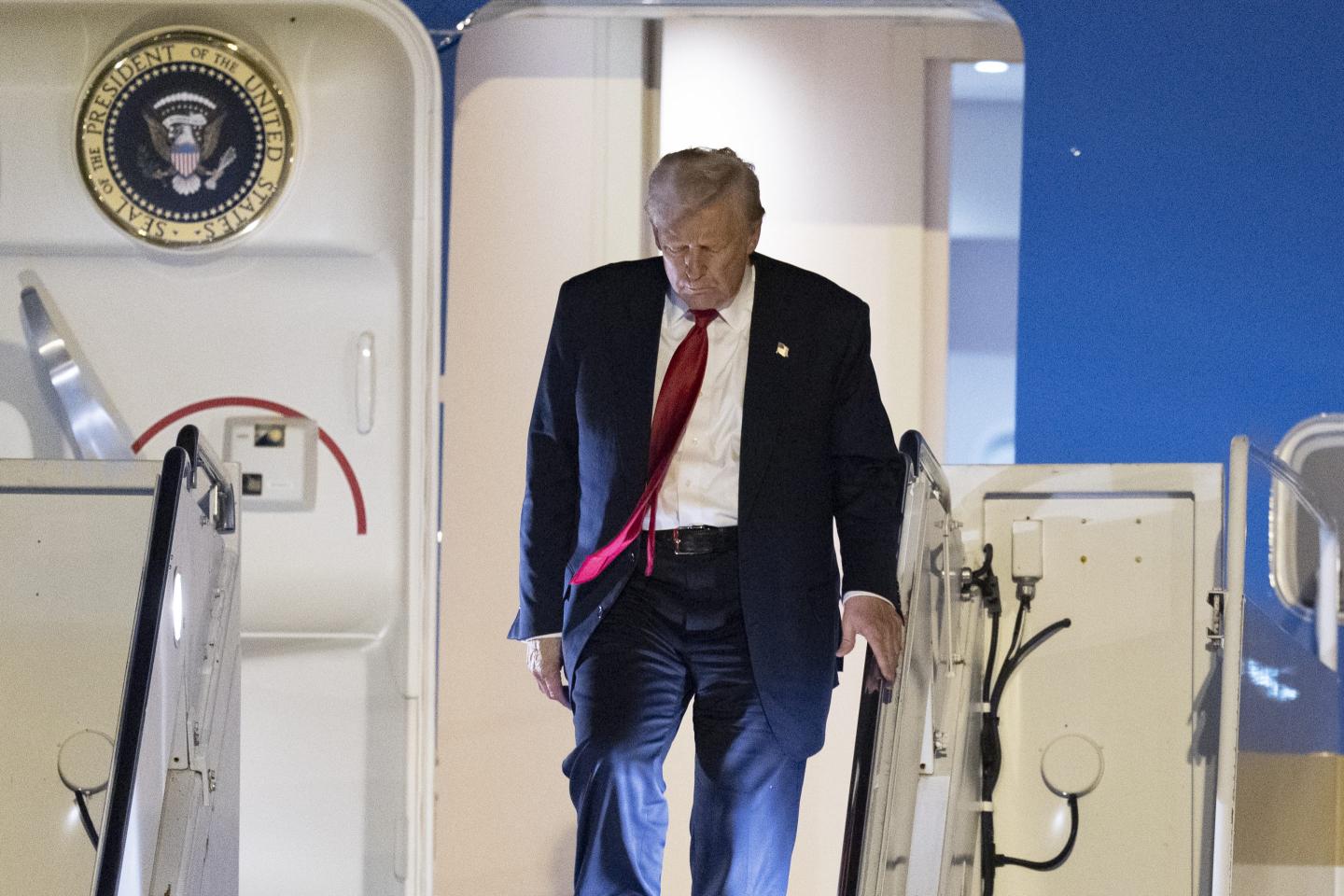 Trump invokes 18th century law to speed deportations, judge stalls it hours later