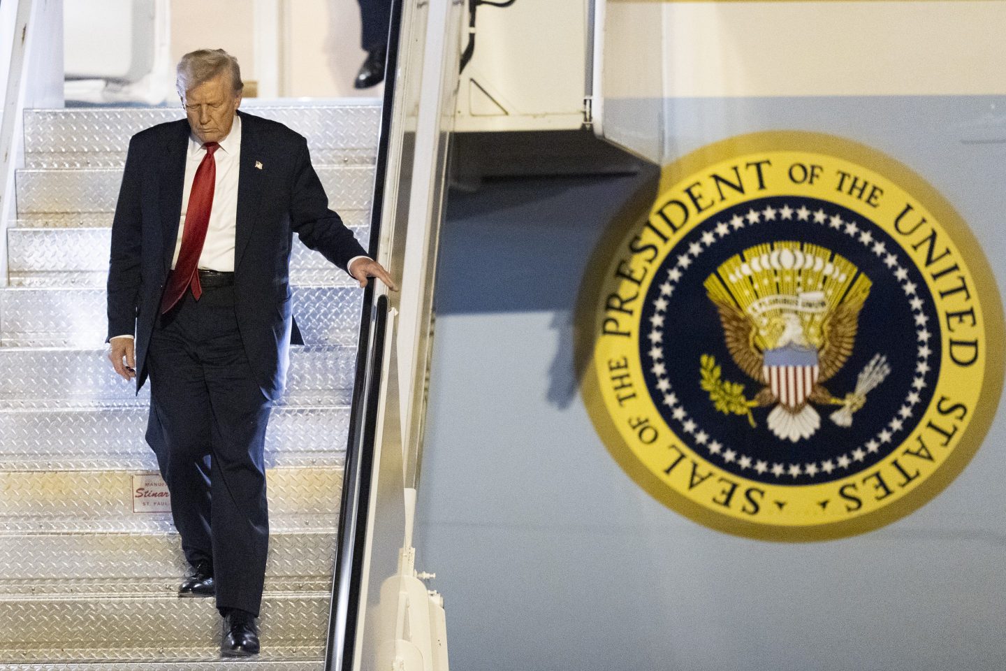 President Donald Trump arrives on Air Force One at Palm Beach International Airport, on March 14, 2025, in West Palm Beach, Fla.