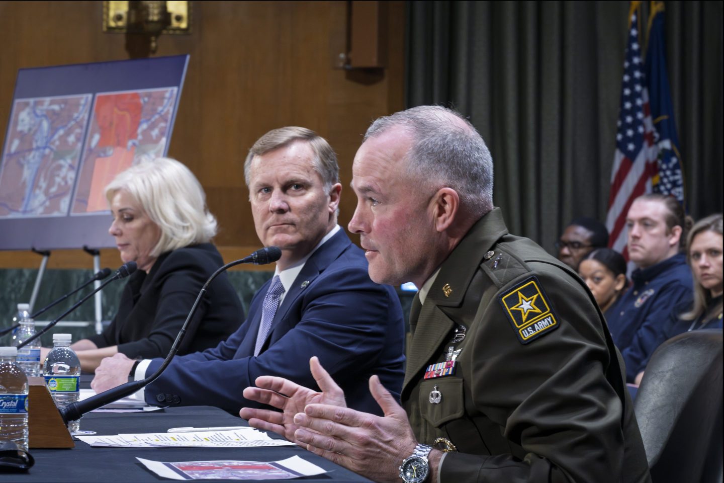 Brig. Gen. Matthew Braman, director of Army Aviation, center, answers questions, joined from left by Jennifer Homendy, chair of the NTSB, and Chris Rocheleau, acting administrator of the FAA, as the Senate Transportation Subcommittee holds a hearing to examine the preliminary report by the NTSB on the Jan. 29, 2025, midair collision of an Army Black Hawk helicopter and an American Airlines regional jet, on Capitol Hill in Washington, on March 27, 2025.