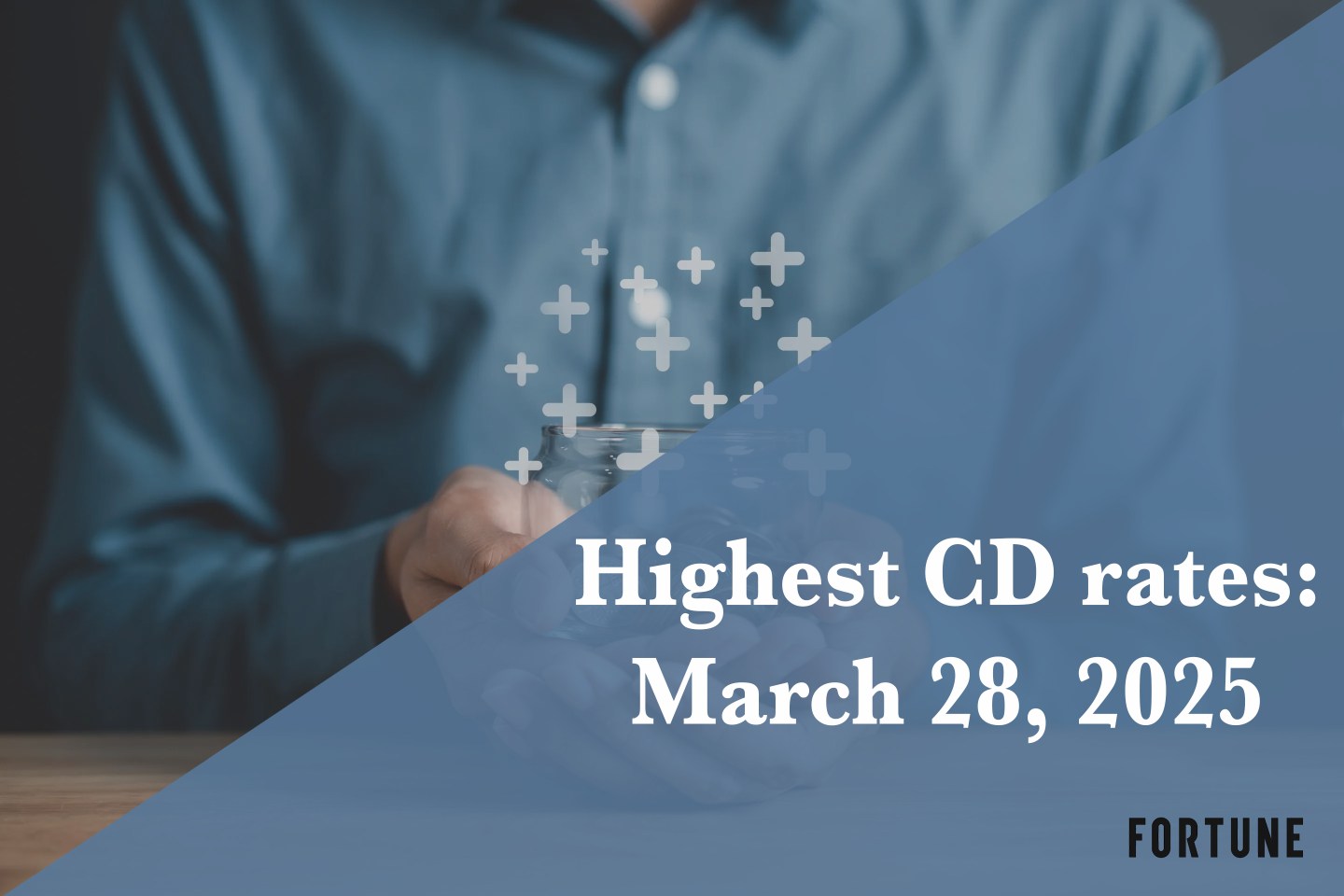 A person holding a jar full of coins.