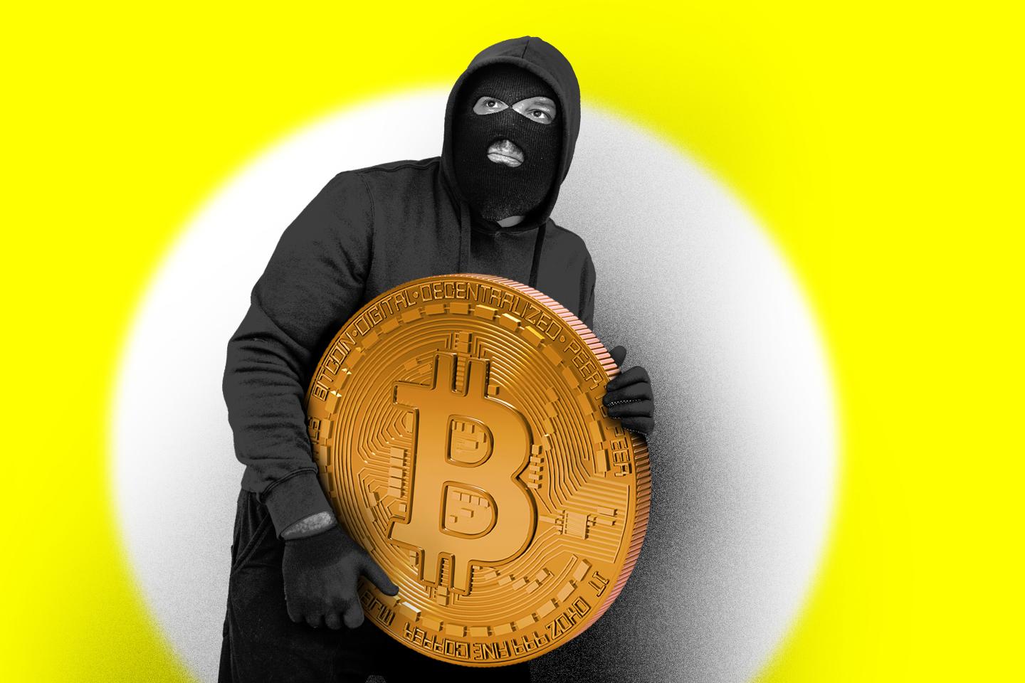 One man; male criminal dressed all in black; carrying stolen Bitcoin