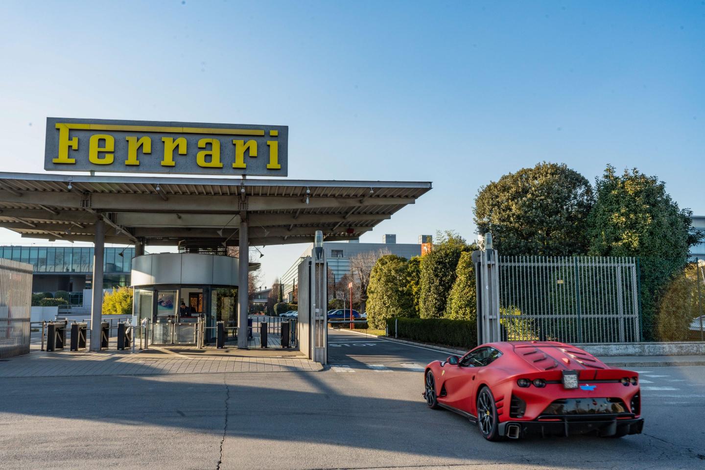 An entrance to the Ferrari NV headquarters and automobile plant in Maranello, Italy, on Tuesday, Feb. 7, 2023. Speaking at Ferraris Maranello headquarters, Ferrari Chief Executive Officer Benedetto Vigna, 53, credited Tesla with accelerating change within an industry steeped in engine cylinders.