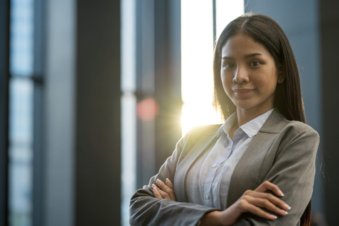 A businesswoman standing in her office