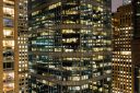 Residential and office buildings are pictured at night in the Manhattan borough of New York on January 29, 2024.