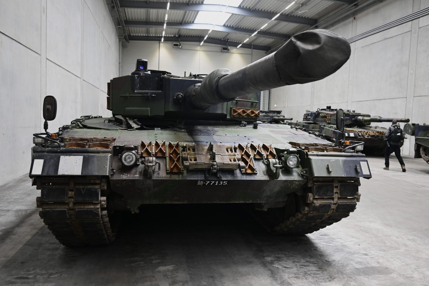 A view of a Leopard 2 tank at a production line as German Chancellor Olaf Scholz and Defence Minister Boris Pistorius attend the groundbreaking ceremony for a new munitions factory of German defence contractor Rheinmetall on February 12, 2024 in Unterluess, Germany. The war in Ukraine has been a boon to Rheinmetall as Germany seeks to provide Ukraine with munitions, including artillery shells, and also increase its own supply.