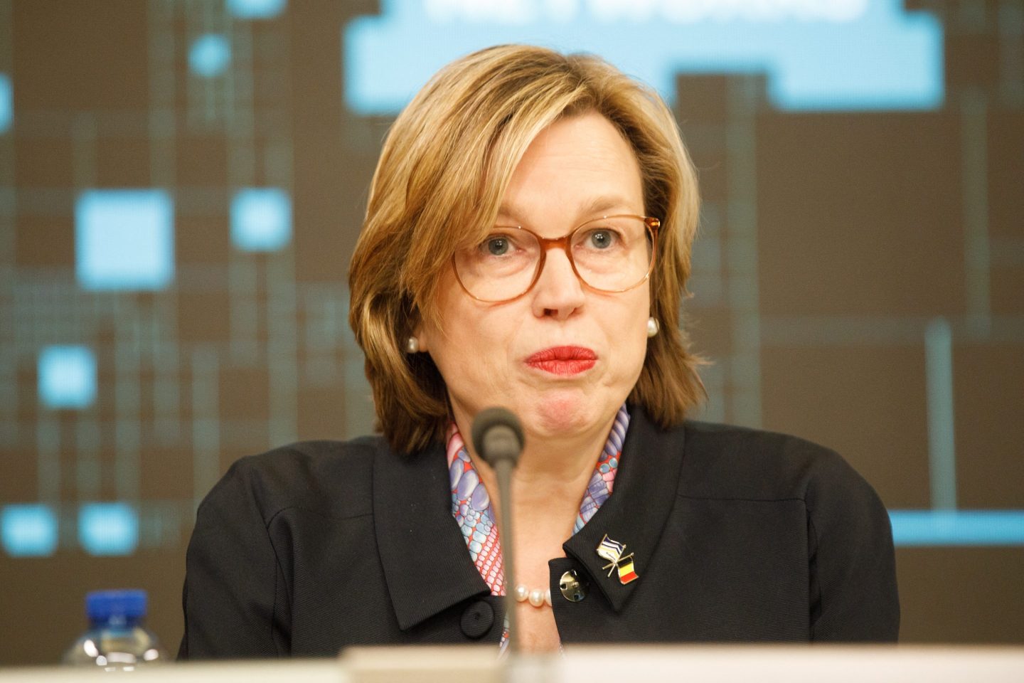 Europol executive director Catherine De Bolle speaks into a microphone