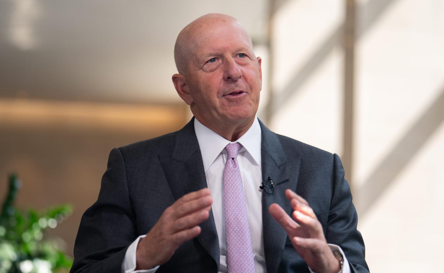 David Solomon, CEO of Goldman Sachs, speaks to reporters