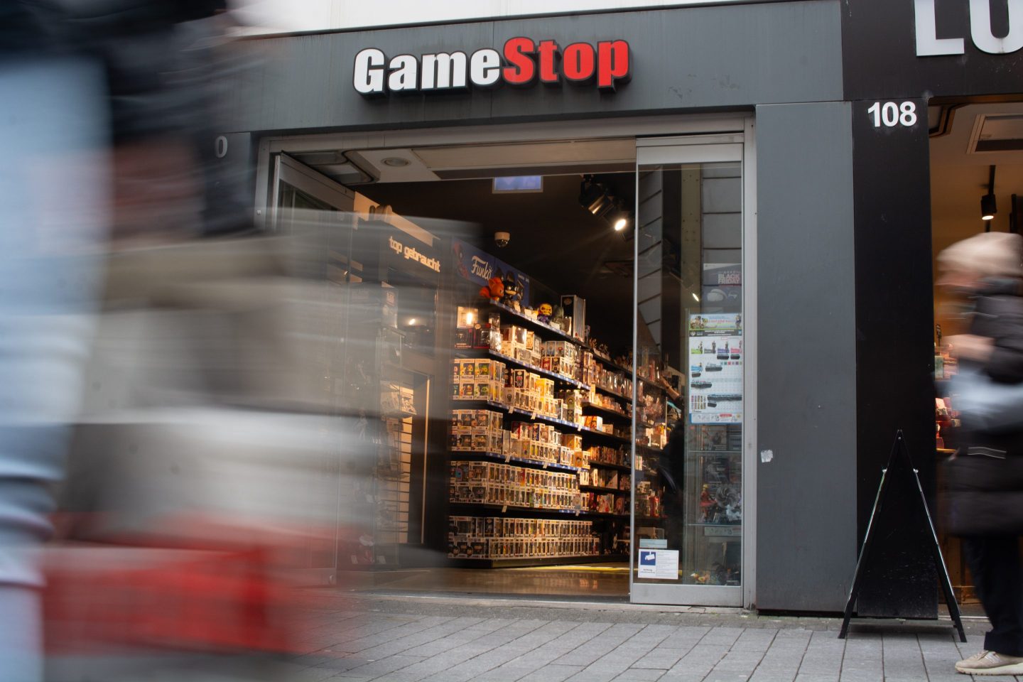 Gamestop shares fell double digits after announcing $1.3 billion Bitcoin purchases.