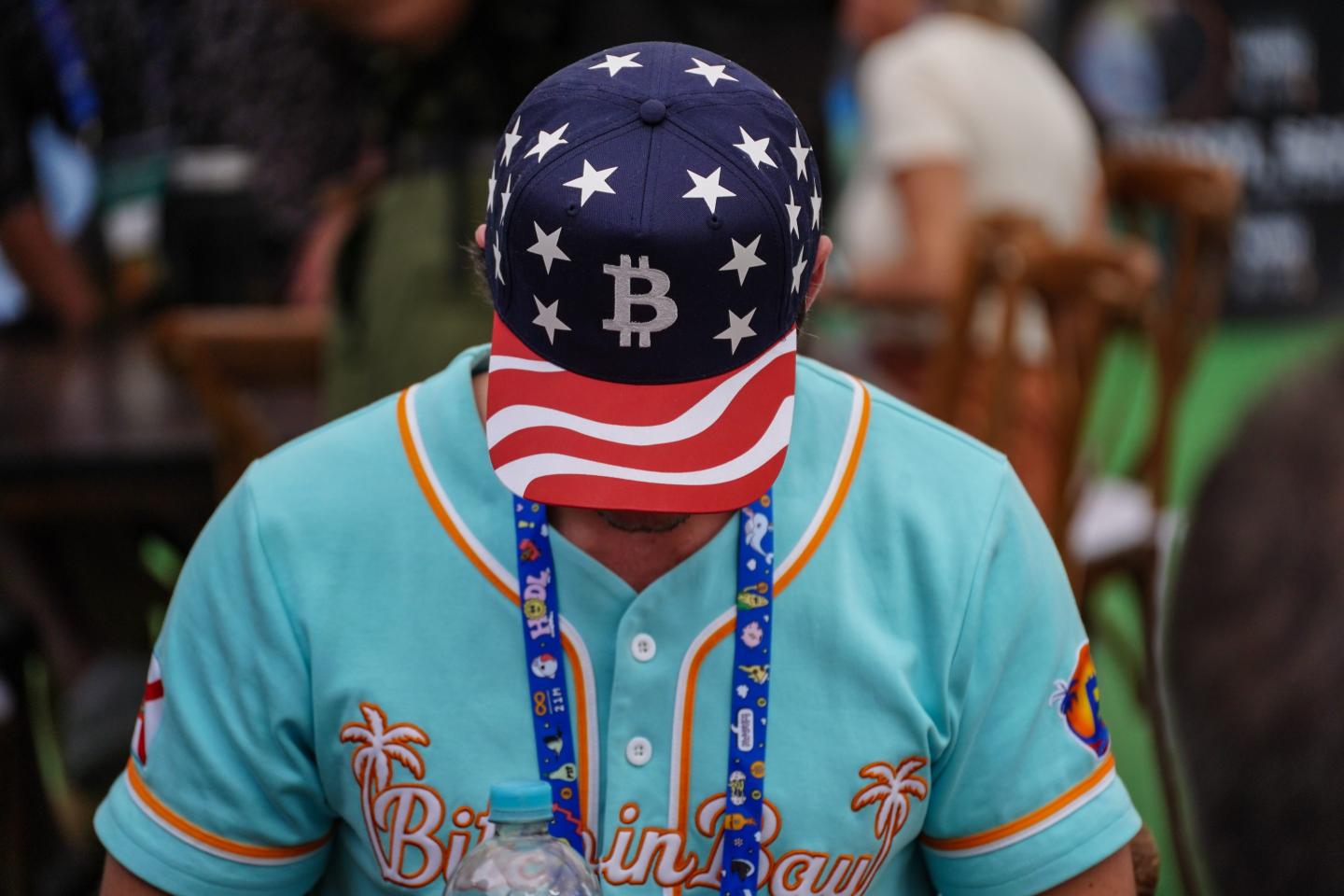 Crypto day-trader faithful find life under Trump is no paradise