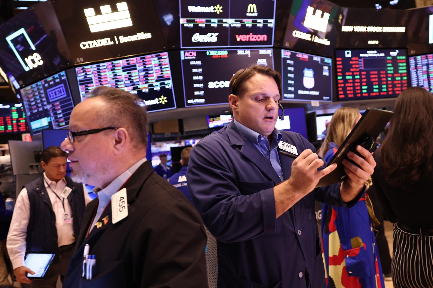 Traders work on the floor of the New York Stock Exchange.