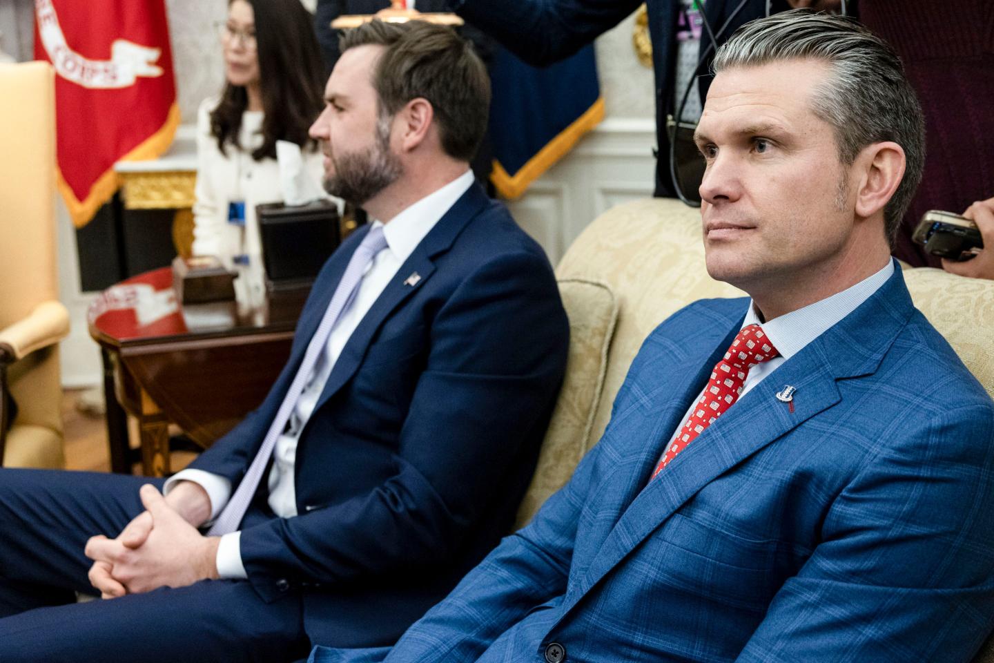 Vice President JD Vance and Secretary of Defense Pete Hegseth sitting on a couch in the Oval Office