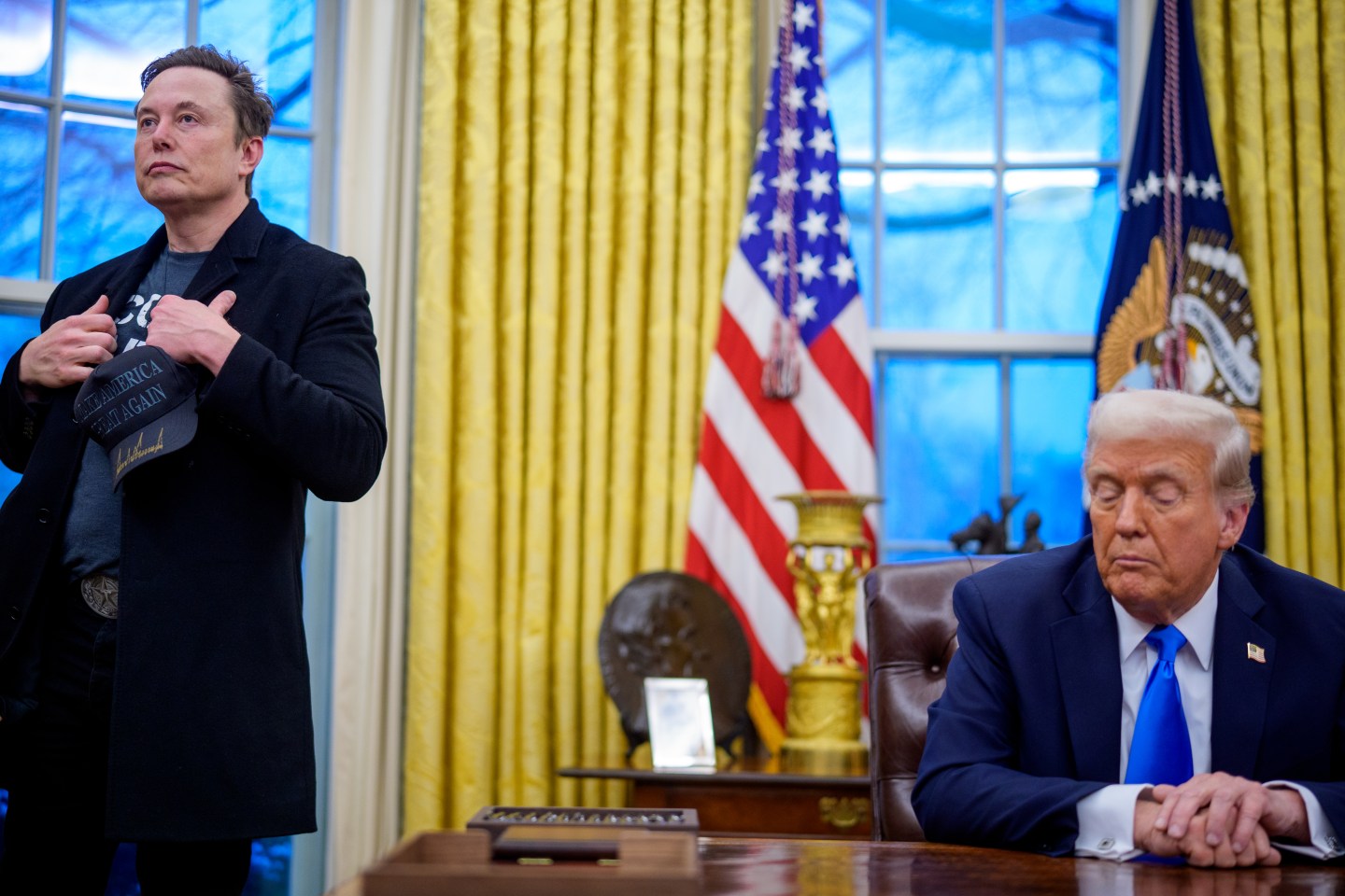 Elon Musk and Donald Trump in the oval office.