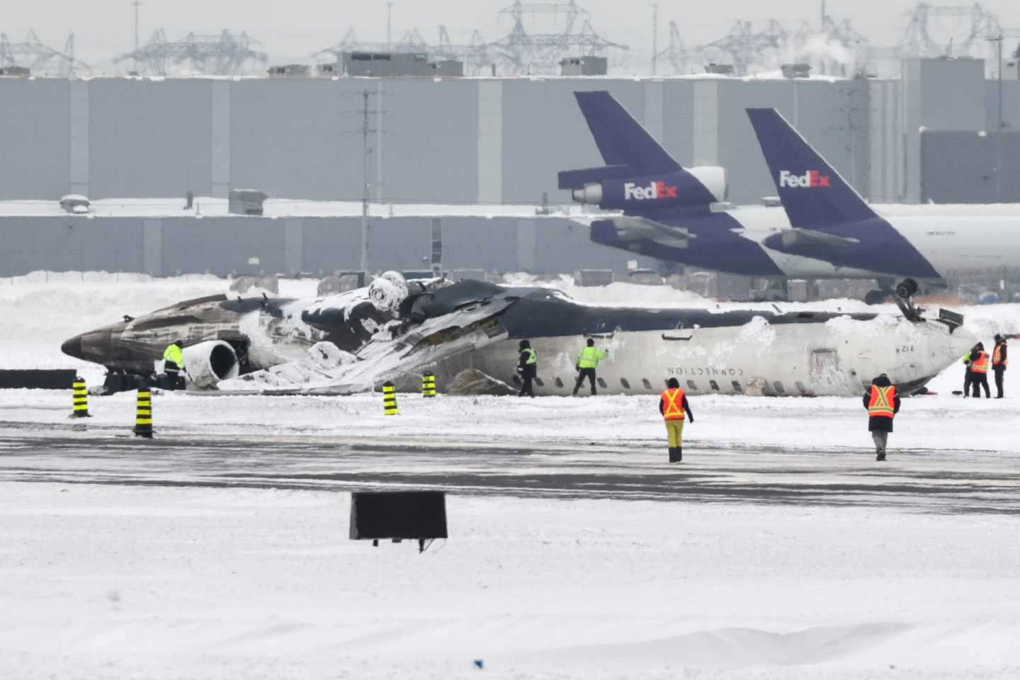 Wreckage of Delta Airlines plane that crashed upon landing at Toronto Pearson Airport