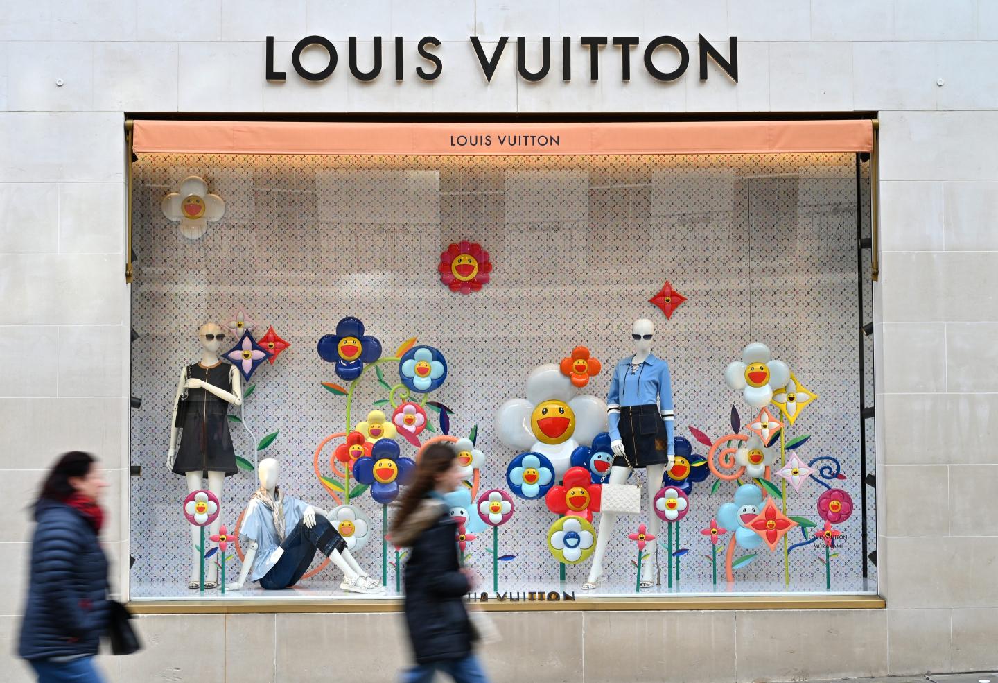 people outside a LV store