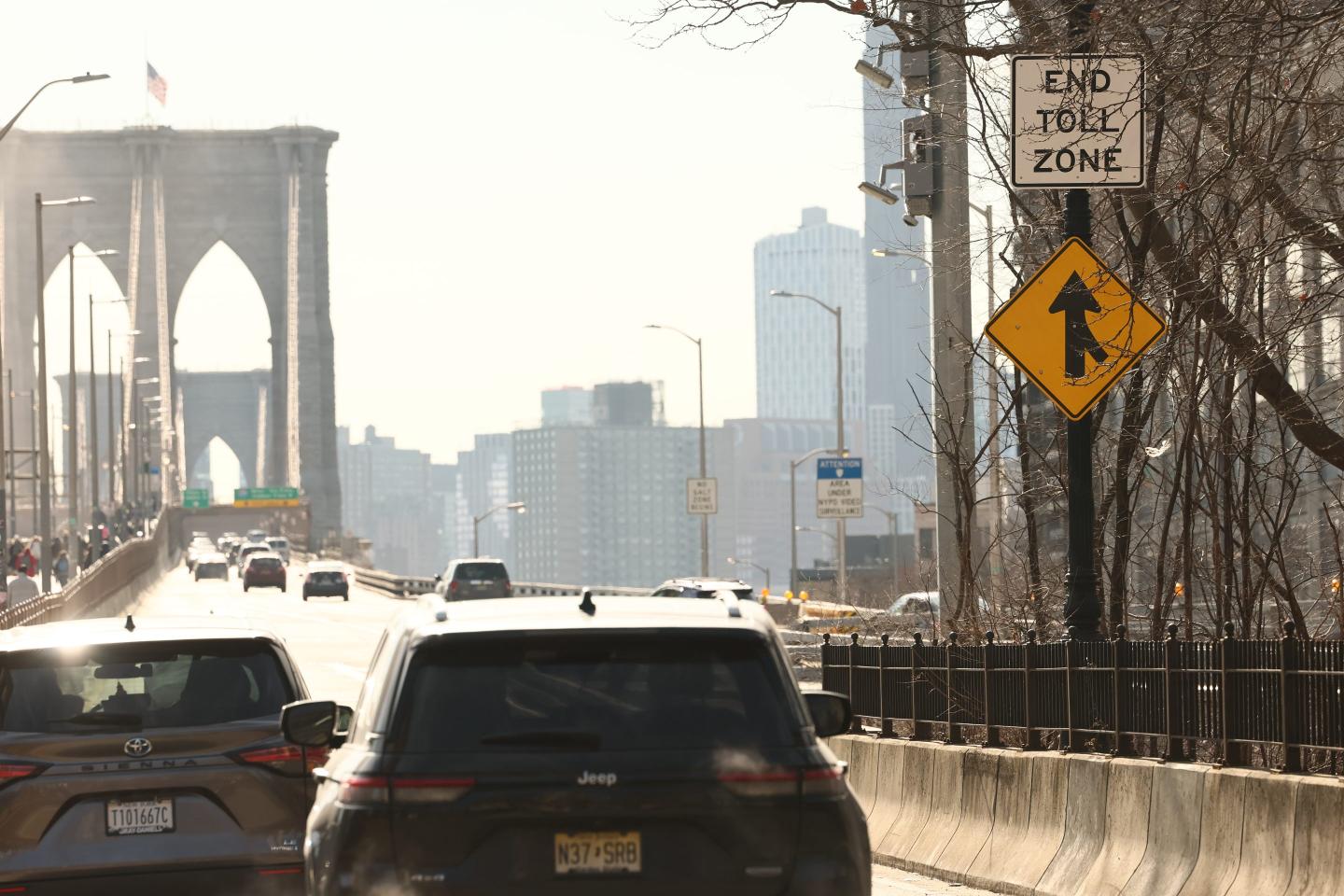 Toll signs are seen on Park Row