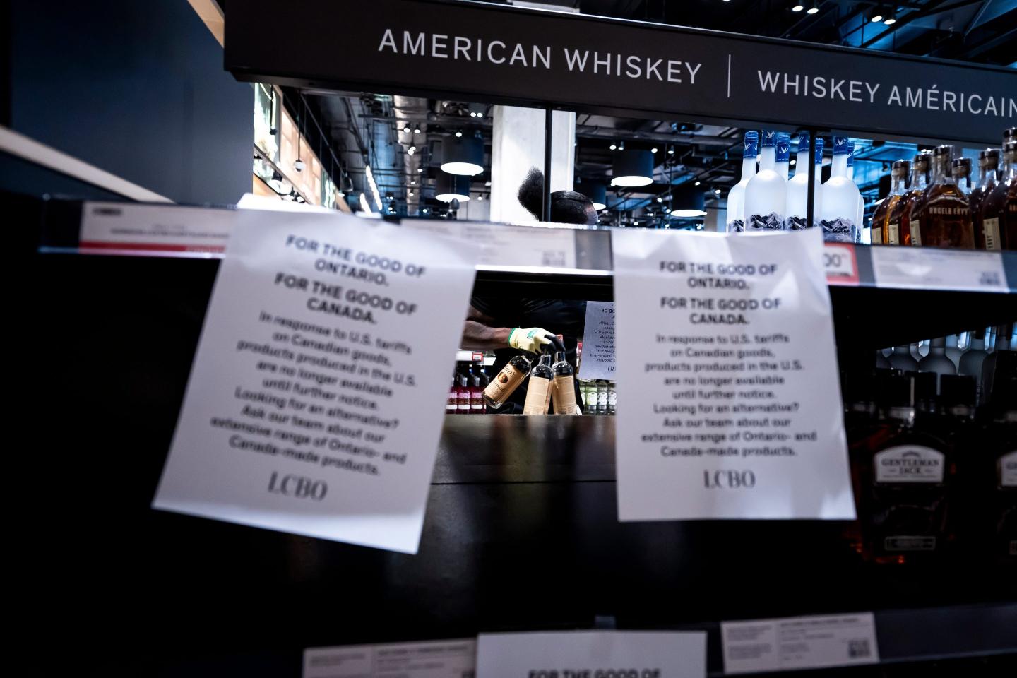 Empty American whiskey shelves at the Queen's Quay store in Toronto, Ontario.
