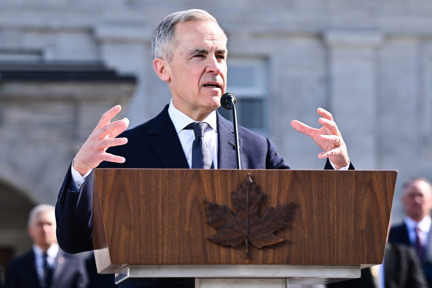 New Canadian Prime Minister Mark Carney addresses the media after being sworn in at Rideau Hall on Friday.