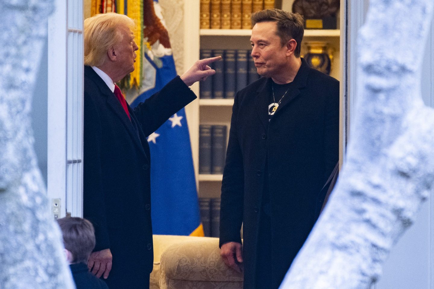 U.S. President Donald Trump (left) and Elon Musk speak in the White House on March 14, 2025.