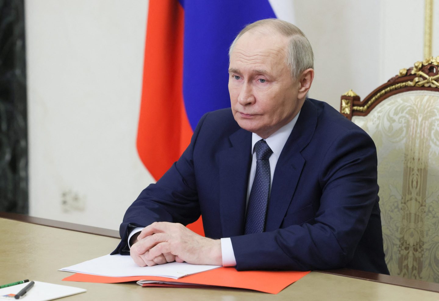 Russian President Vladimir Putin chairs a Security Council meeting via videoconference at the Kremlin on Friday.