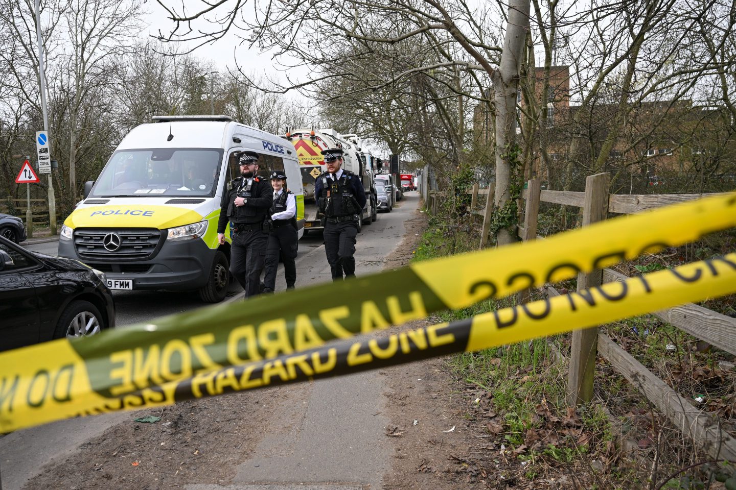 Police officers at a cordon near a fire at North Hyde Electricity Substation near London Heathrow Airport