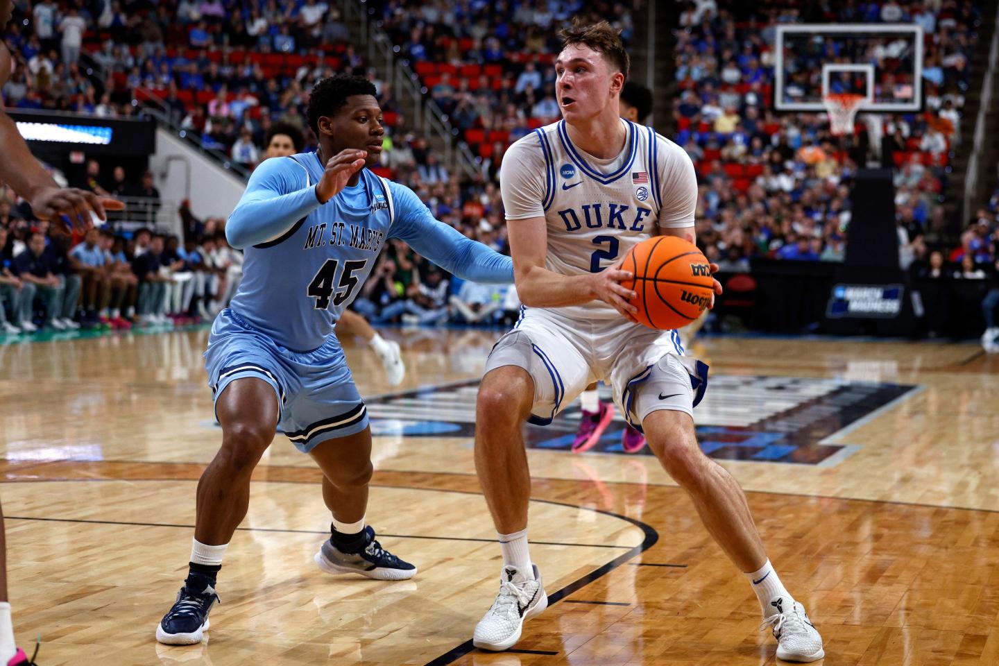 Cooper Flagg #2 of the Duke Blue Devils drives with the ball against Xavier Lipscomb #45 of the Mount St. Mary's Mountaineers in the second half during a first round game of the men's NCAA basketball tournament at Lenovo Center on March 21, 2025 in Raleigh, North Carolina.