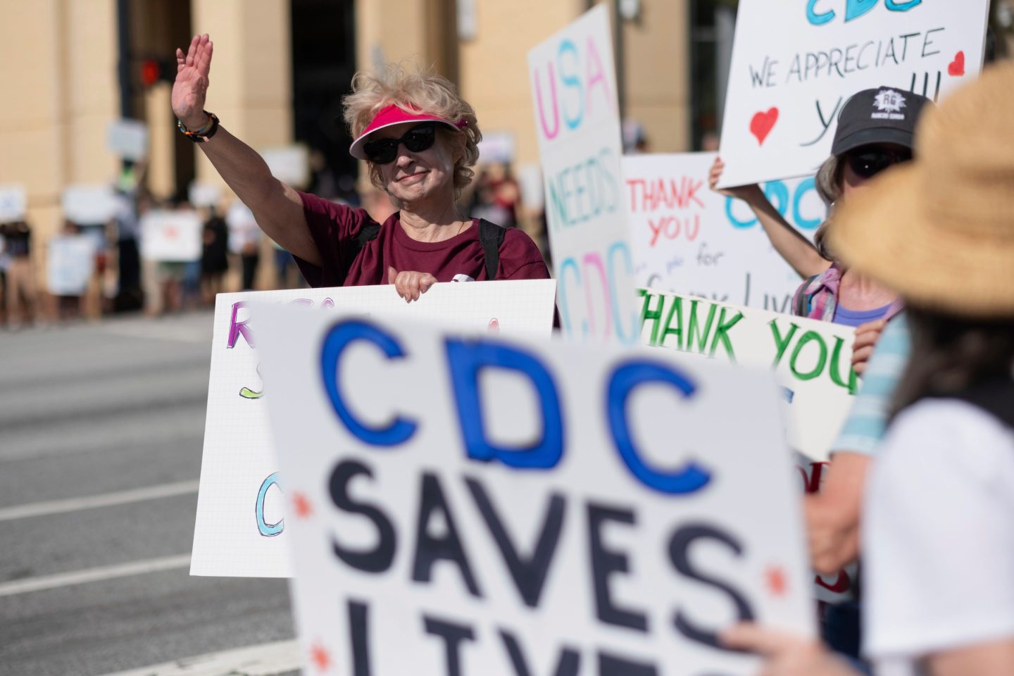 Lynn Sokler, who retired from the CDC three weeks ago after working there almost two decades, protests with others in support of the Centers for Disease Control and Prevention in front of the headquarters in Atlanta, on April 1, 2025. 