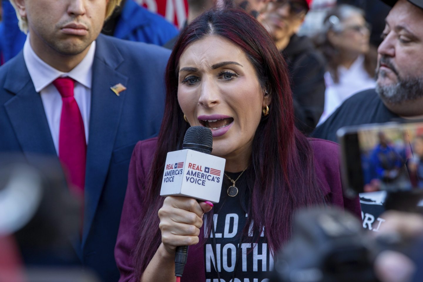 Right-wing activist Laura Loomer speaks in front of the courthouse where the hush-money trial of Donald Trump was underway, April 15, 2024, in New York.