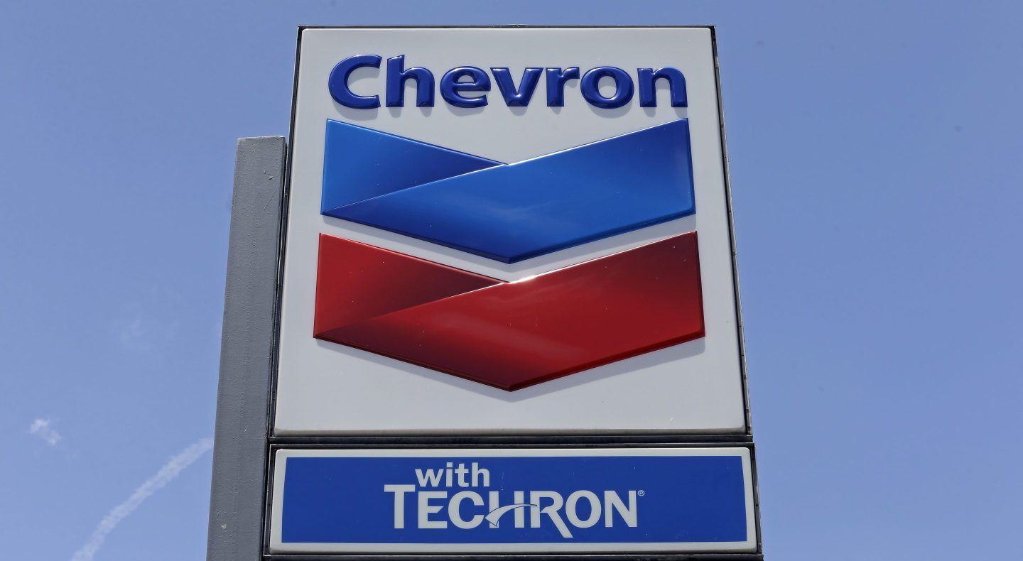 A Chevron sign on a gas station