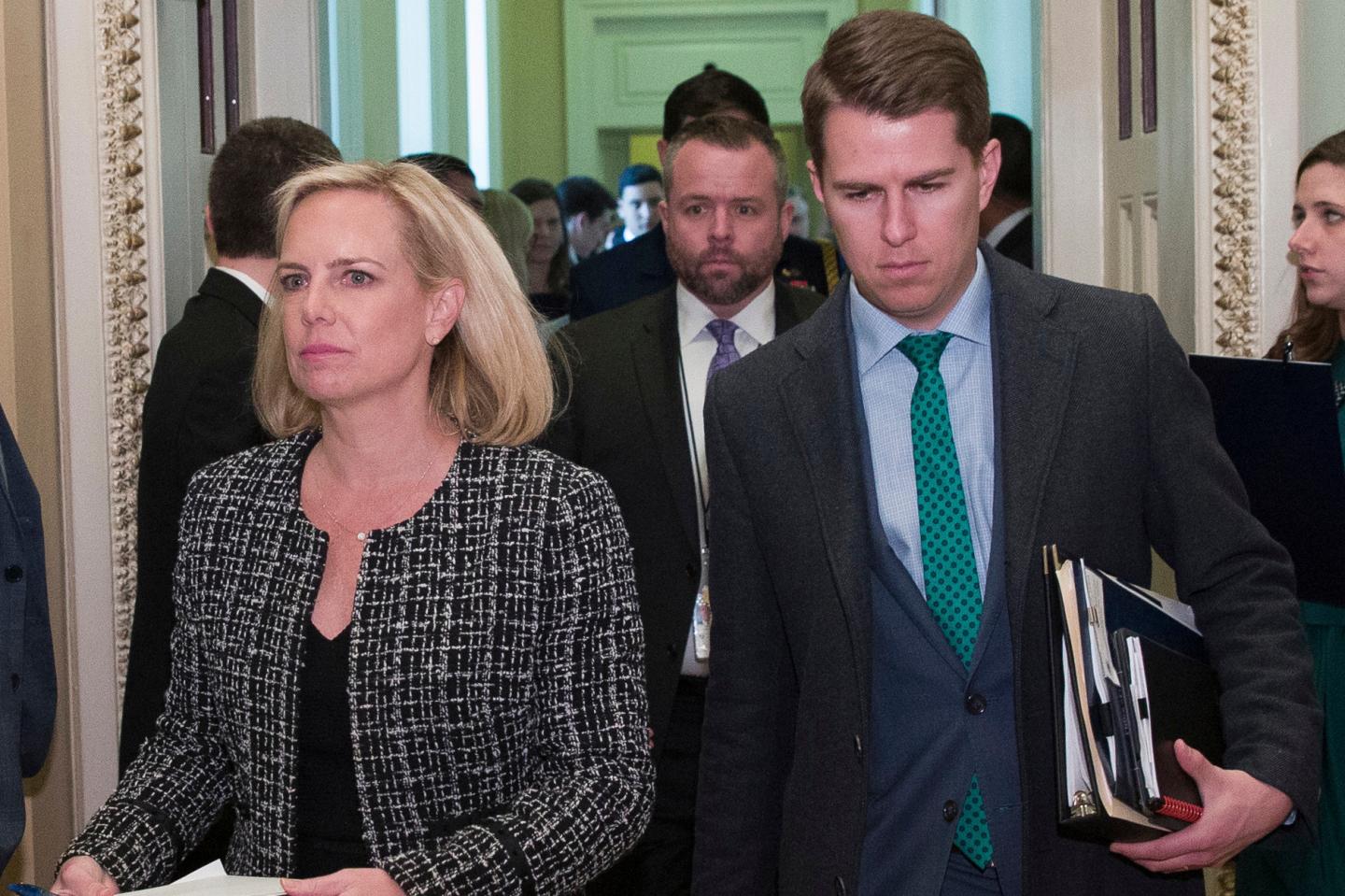 Homeland Security Secretary Kirstjen Nielsen and Department of Homeland Security chief of staff Miles Taylor, right, depart after the Republican Caucus luncheon, at the U.S. Capitol in Washington, March 5, 2019. 