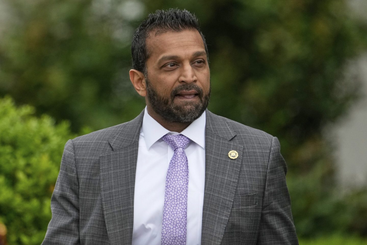 FBI director Kash Patel licks his lips