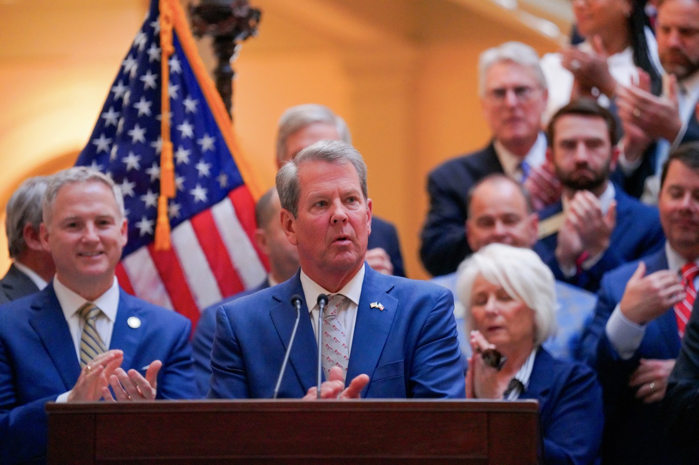 Georgia Gov. Brian Kemp delivers remarks during a bill signing ceremony for tort reform bills SB 68 and SB 69 at the Georgia State Capitol, on April 21, 2025, in Atlanta.
