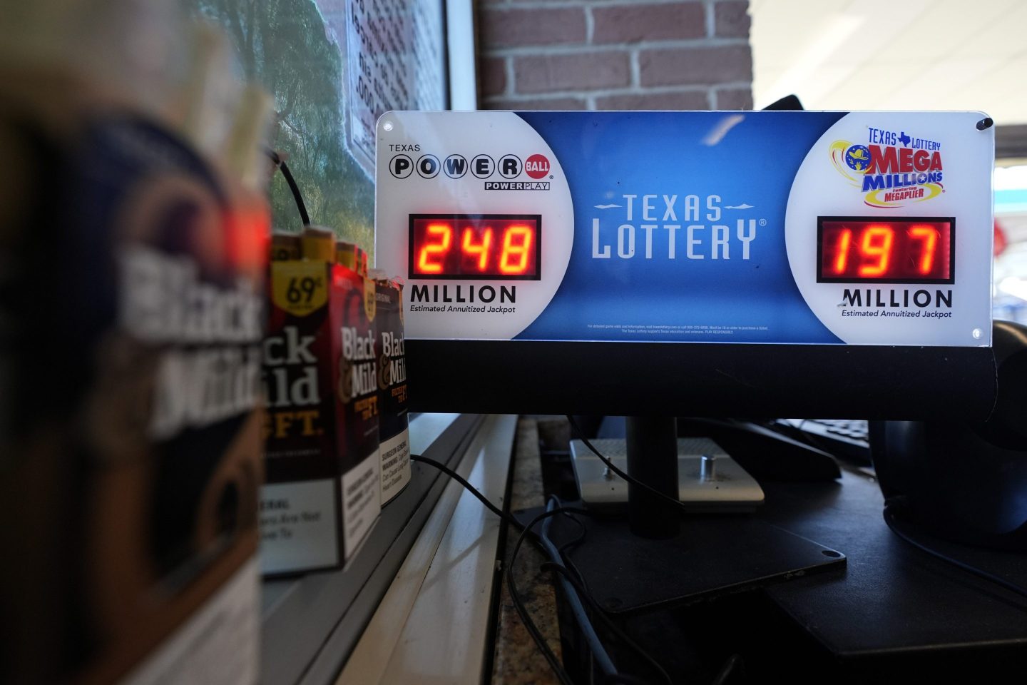 A Texas Lottery sales terminal shows the jackpot amounts up to win at Fuel City in Dallas, on Feb. 26, 2025.