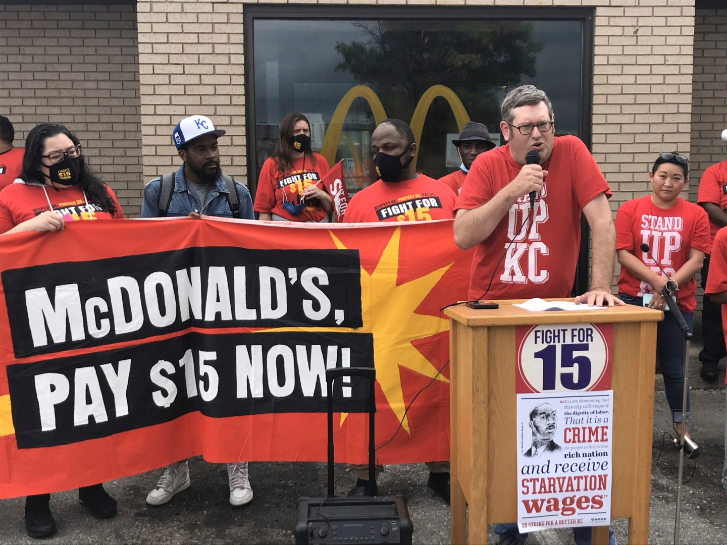 Richard Eiker speaks in support of a strike by fast food workers advocating for a $15 an hour minimum wage outside a McDonald's restaurant in Kansas City, Mo., May 19, 2021.