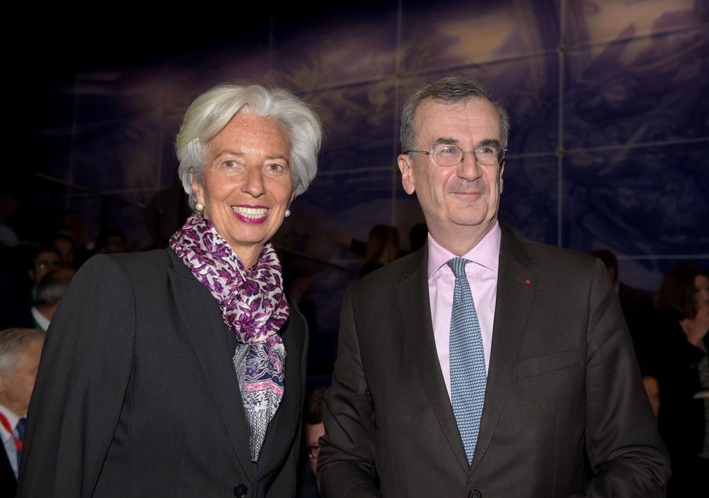 International Monetary Fund (IMF) Managing Director Christine Lagarde (L) and Governor of the Banque de France (French central bank) Francois Villeroy de Galhau pose prior to the start of a Symposium on the occasion the 20th anniversary of the euro at the Banque de France, co-organized with the European Money and Finance Forum (SUERF), in Paris on March 28, 2019.