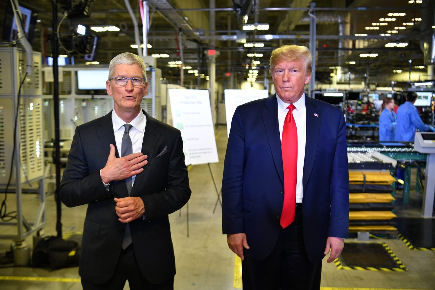 Apple CEO Tim Cook (left) and President Donald Trump.