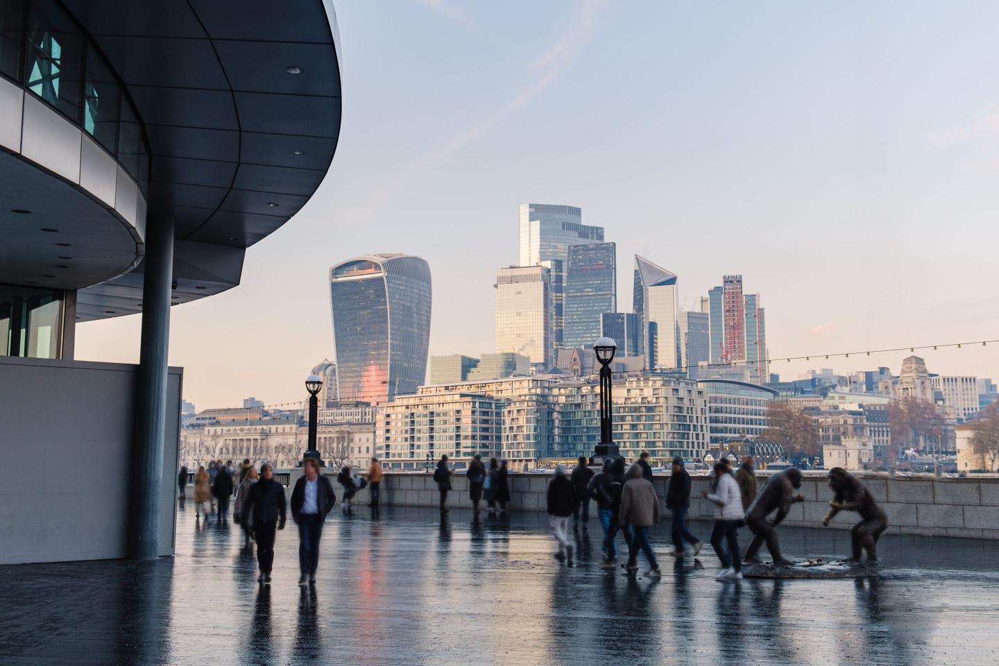 London, blurred motion of incidental business people walking to work