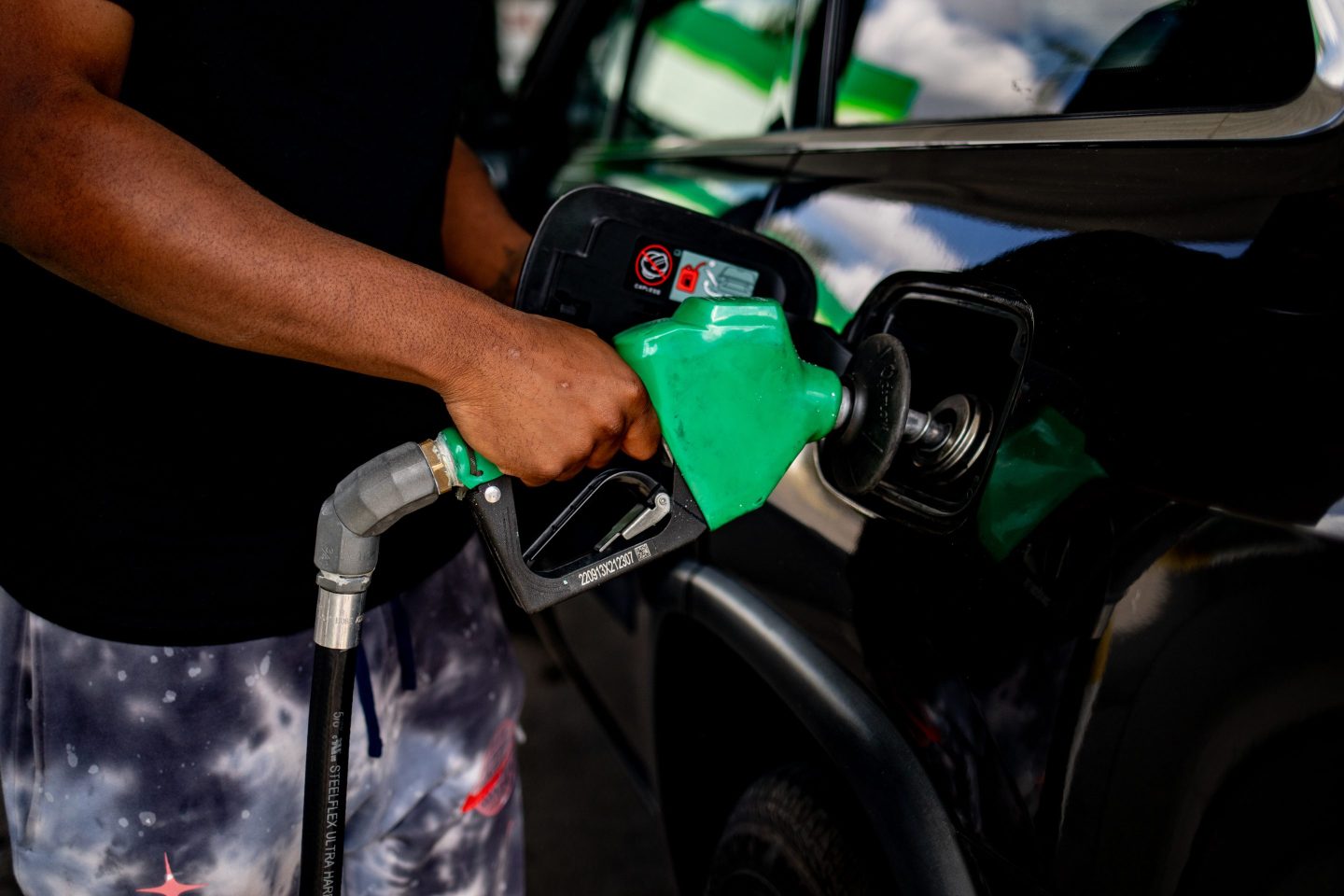 A driver refuels their vehicle at a BP gas station in Detroit, Michigan, US, on Thursday, Sept. 19, 2024.