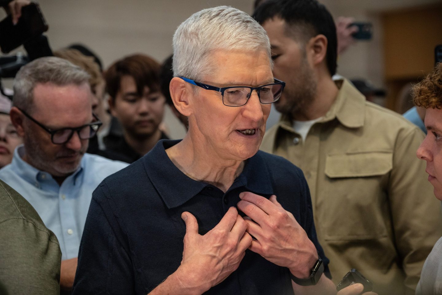 Tim Cook, chief executive officer of Apple Inc., speaks to members of the media during the first day of in-store sales of Apple's latest products at Apple's Fifth Avenue store in New York, US, on Friday, Sept. 20, 2024.